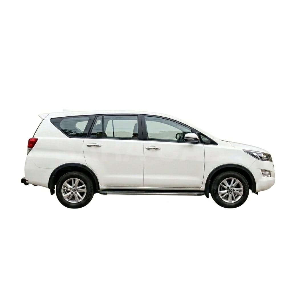 White Toyota Innova MPV taxi in Mysore, chauffeur-driven with SARA CAB